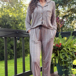 Charcoal Checkers Women's Relaxed Long-Sleeve PJ Set, worn outdoors on a deck