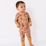 gilded fellowship zip romper 1